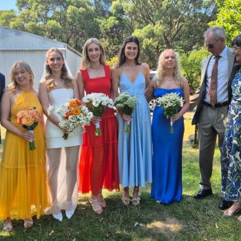 Bride and her bridal party enjoying wedding day moments.