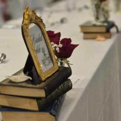 Elegant bridal table decoration with floral arrangements and wedding table setup