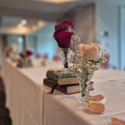 Floral table décor for wedding reception with elegant flowers and centerpiece arrangements