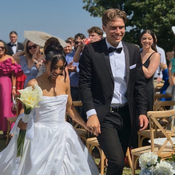 Newlywed couple sharing a joyful moment after the wedding.