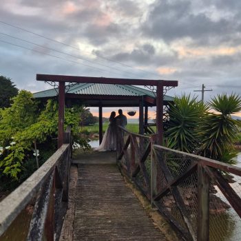 Bride and groom outdoor shoot under a stunning sky